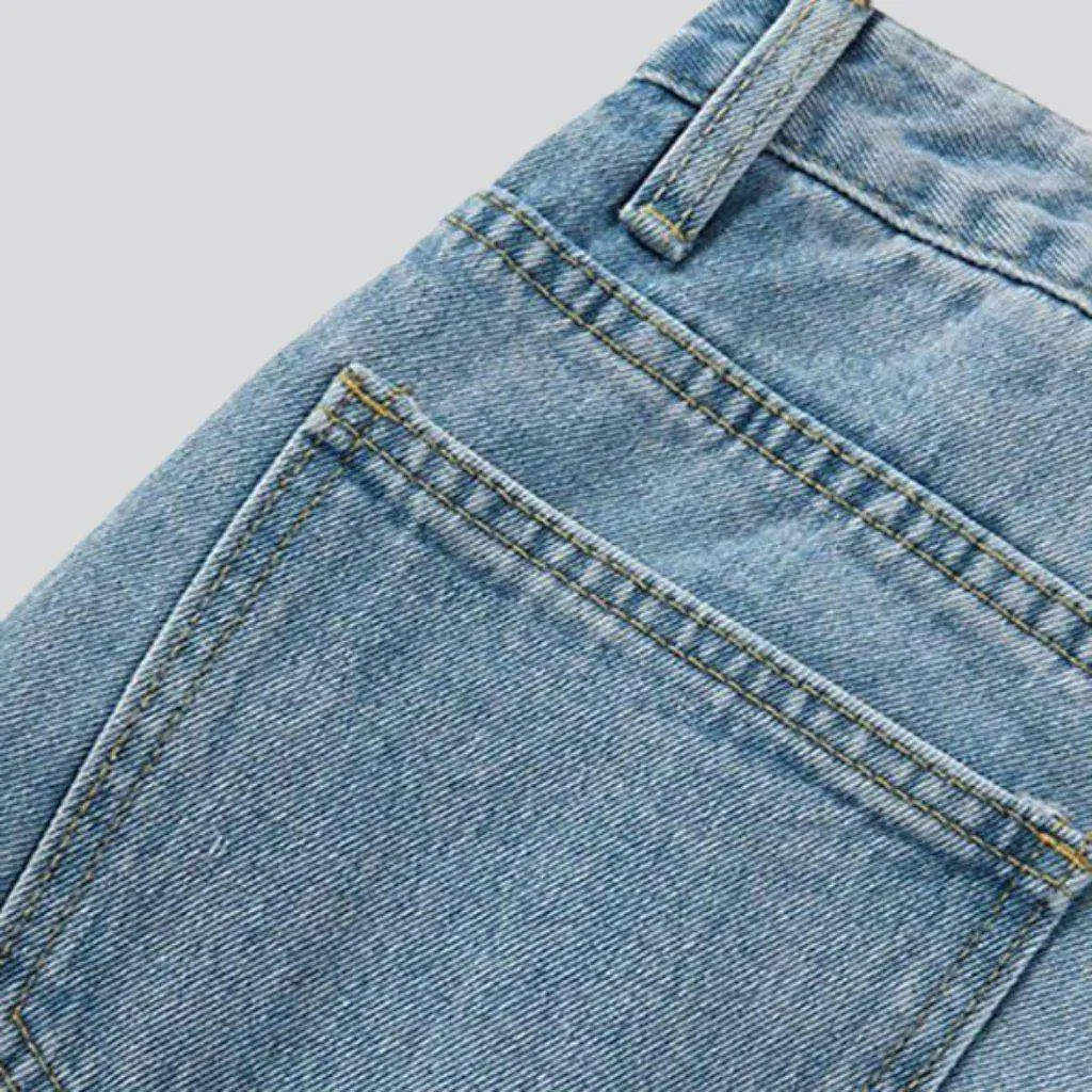Asymmetric buttoned denim skort